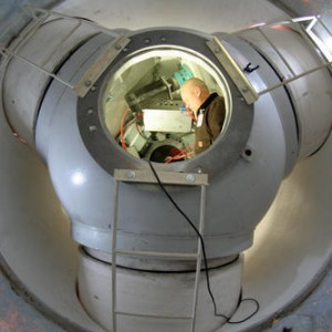 NWTC employee Garth Johnson works in the hub of the new wind turbine rotor installed on the Controls Advanced Research Turbine (CART) at the National Wind Technology Center (NWTC) in December 2006.