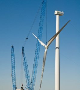 Blades being attached to the General Electric 1.5 MW wind turbine at NREL's NWTC.