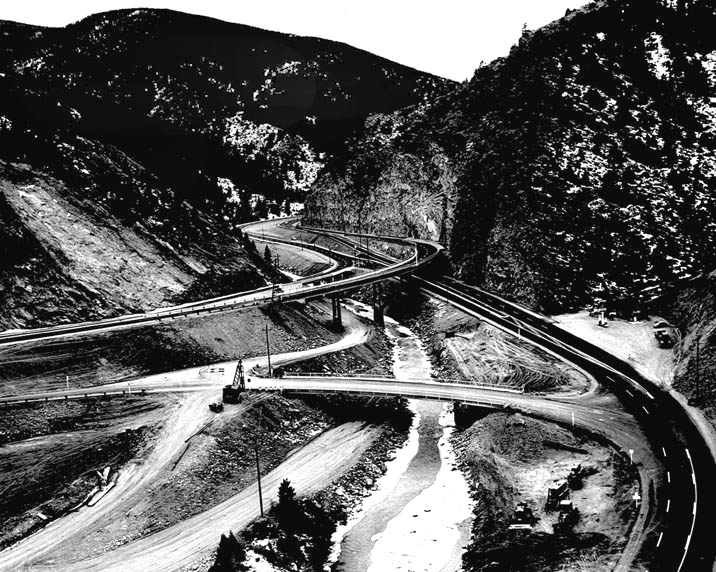 In 1959 this portion of I-70 near Denver at the Floyd Hill interchange was complete except for a small amount of cleanup work. (30-N-60-18)