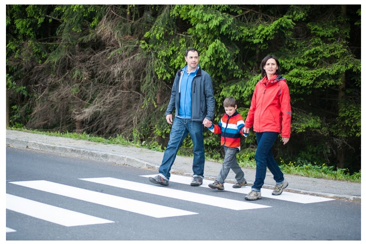 Family on crosswalk