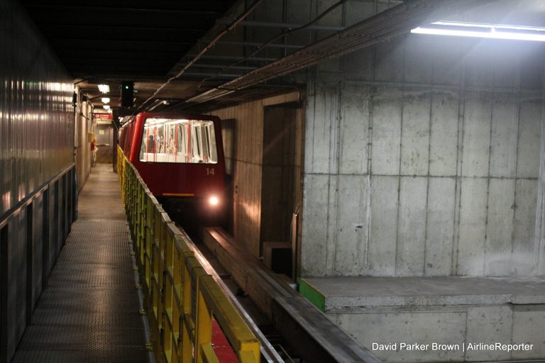 Below ground, one of the trains arrives at SEA